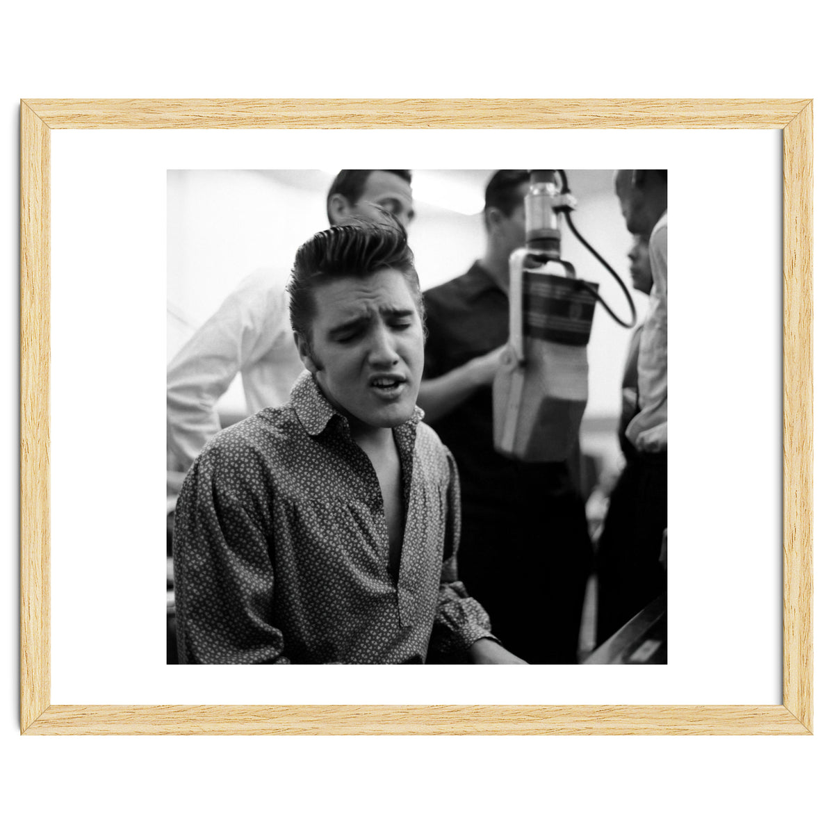 The American singer Elvis Presley during a recording session in 1956.