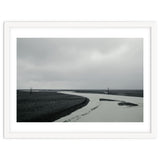 River passing through a black volcanic road - Iceland thumbnail