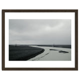 River passing through a black volcanic road - Iceland thumbnail