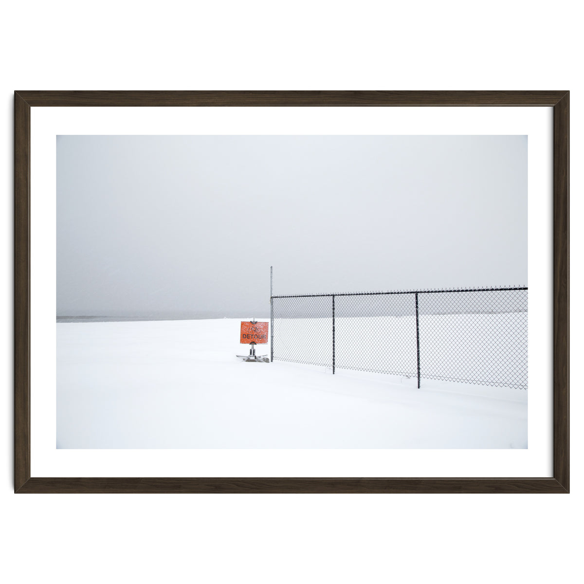 Detour sign in the snow beach