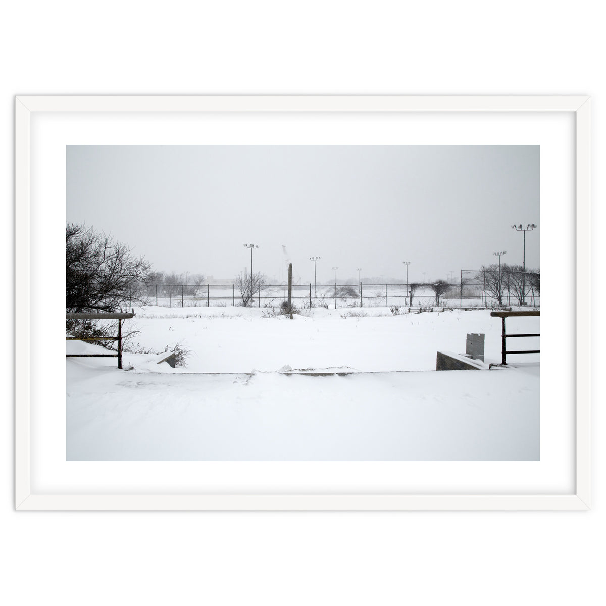 Baseball field covered in snow