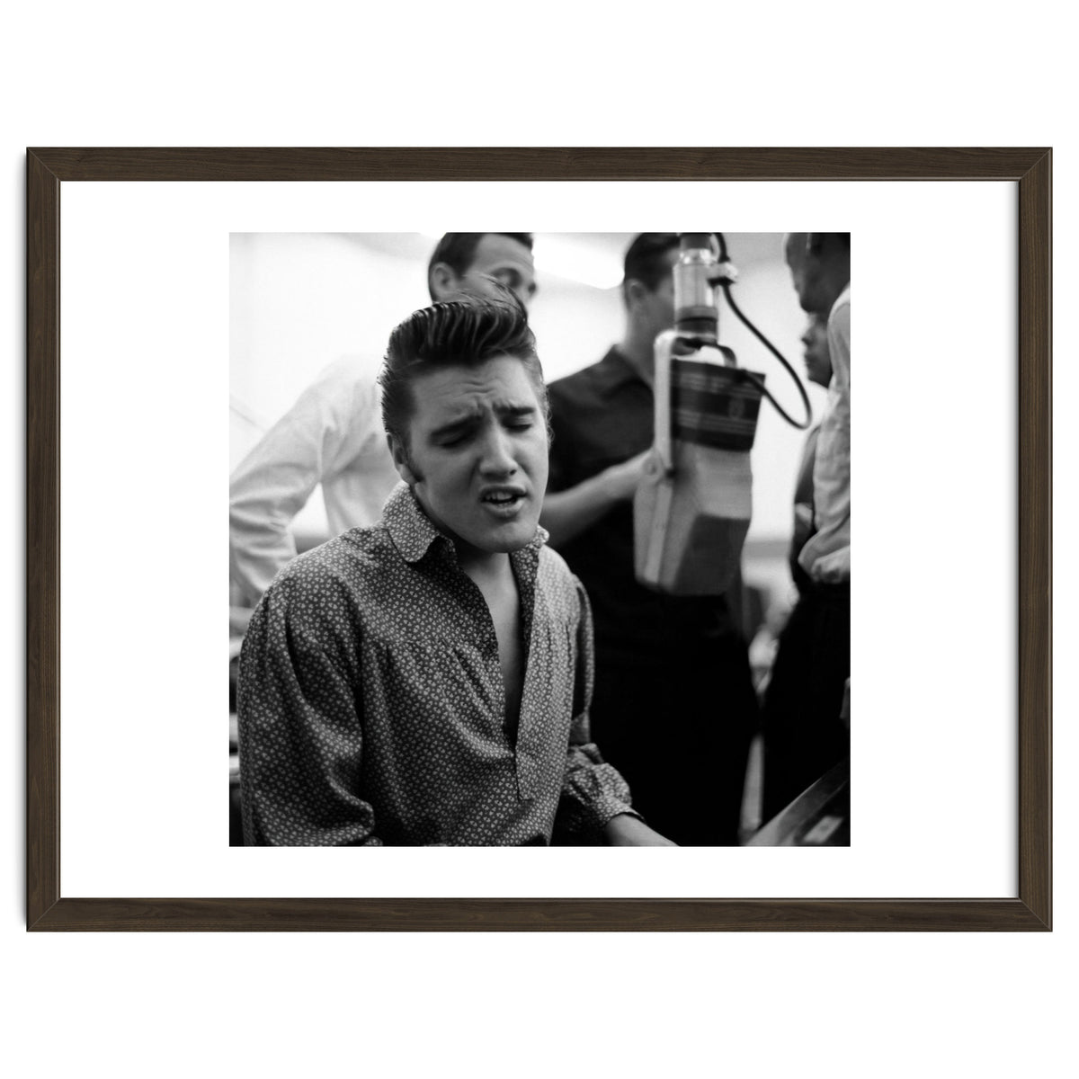 The American singer Elvis Presley during a recording session in 1956.