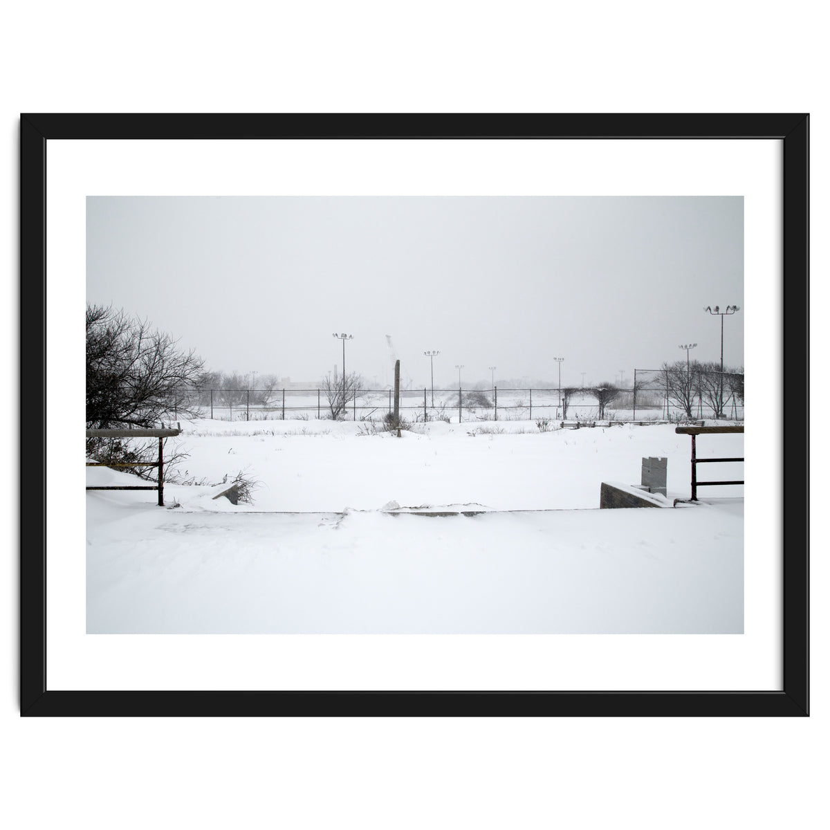 Baseball field covered in snow