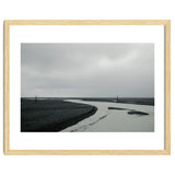 River passing through a black volcanic road - Iceland thumbnail