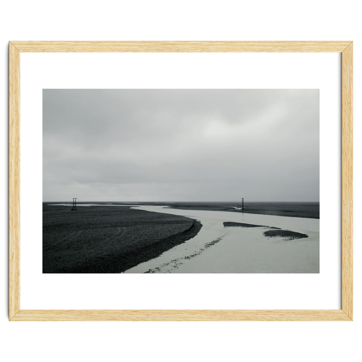 River passing through a black volcanic road - Iceland