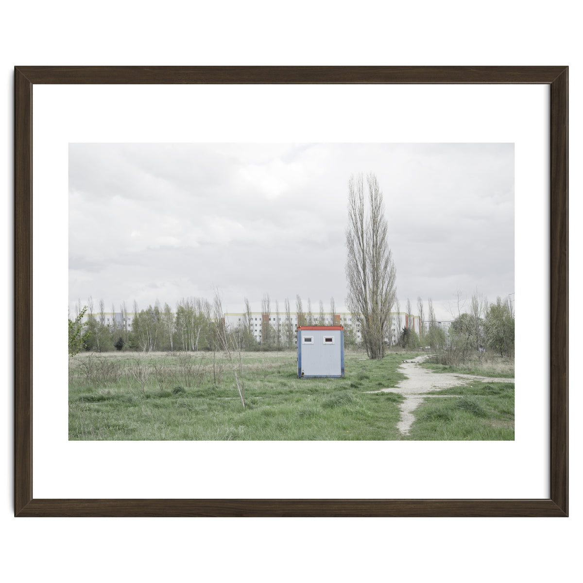 Hut in the middle of green field