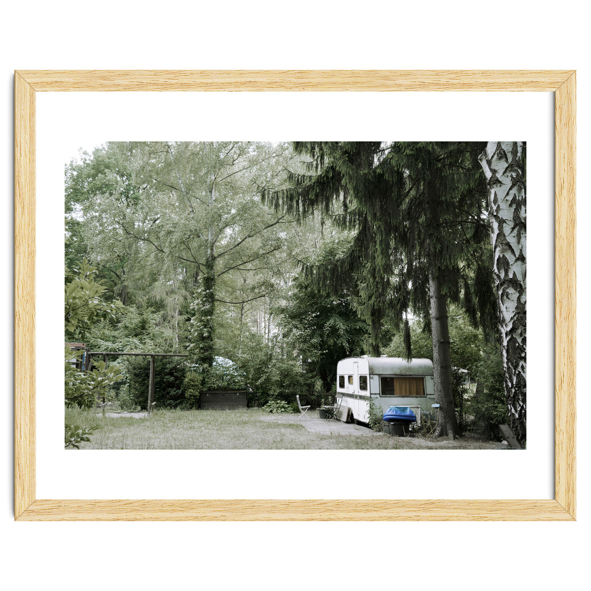 Travel trailer in the green garden