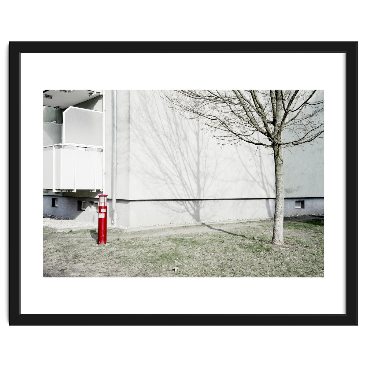 Red light pole and Tree shadow on the wall
