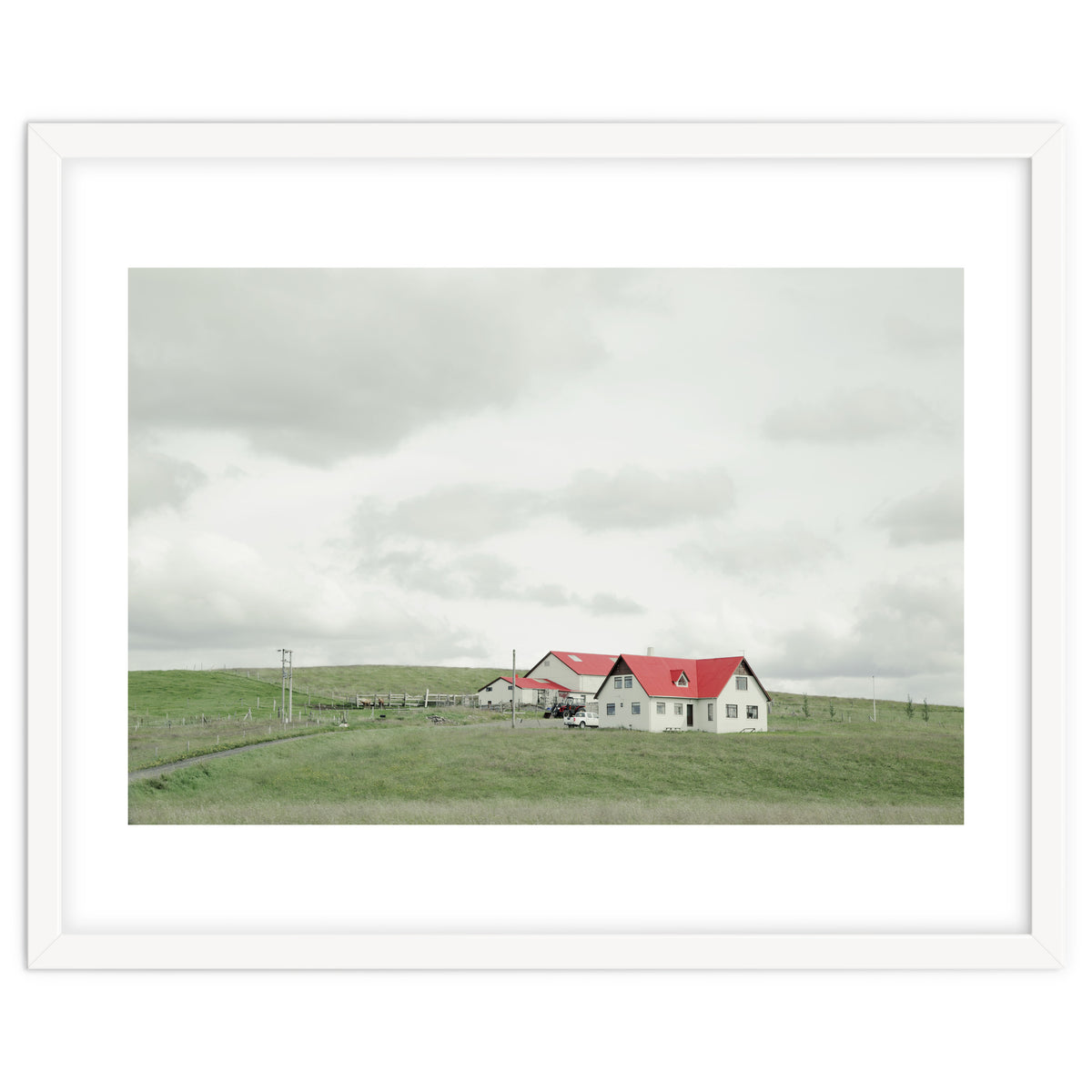 Red roof house on the green hill - Iceland