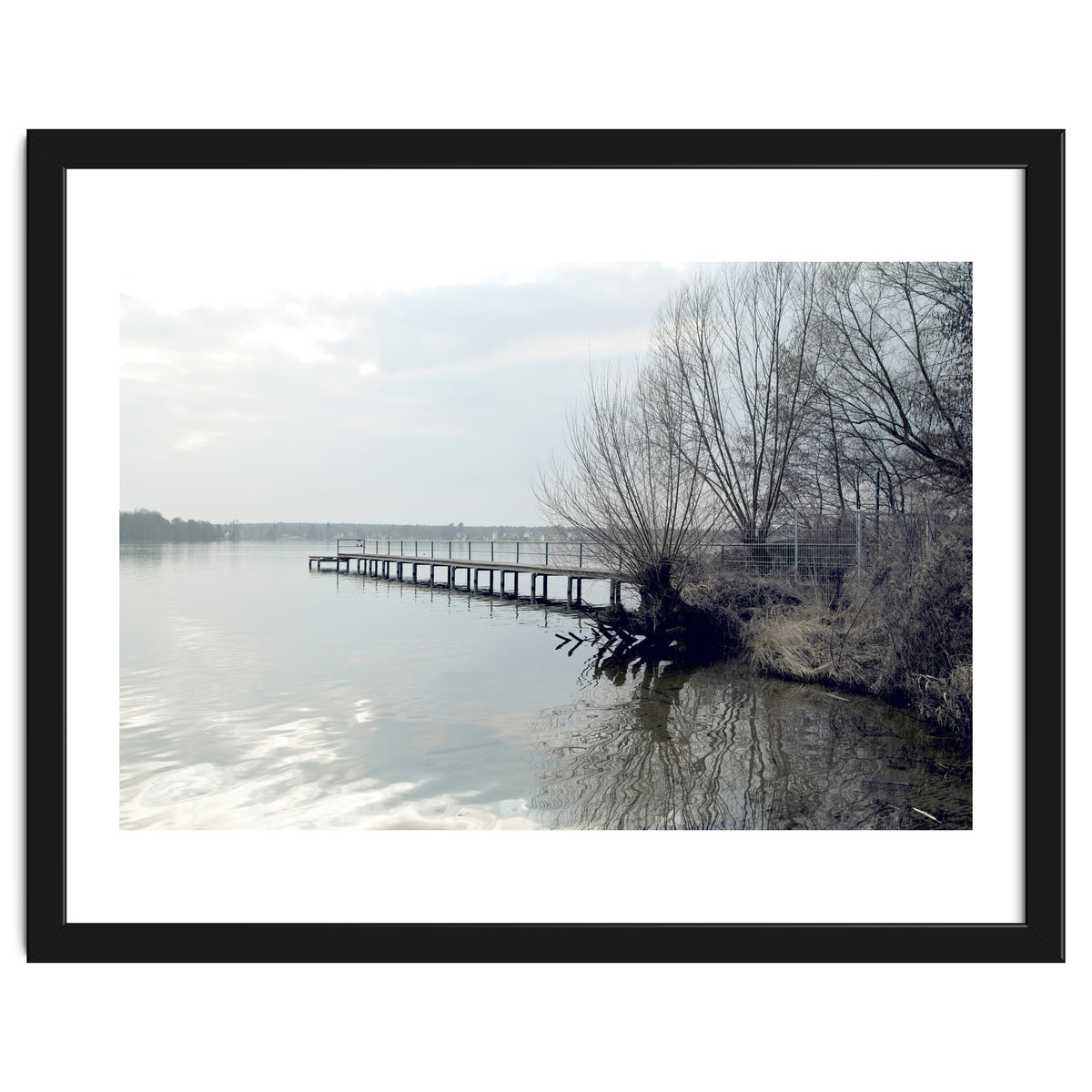 Sunny day pier in the lake