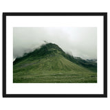 Green mountain covered in clouds - Iceland thumbnail