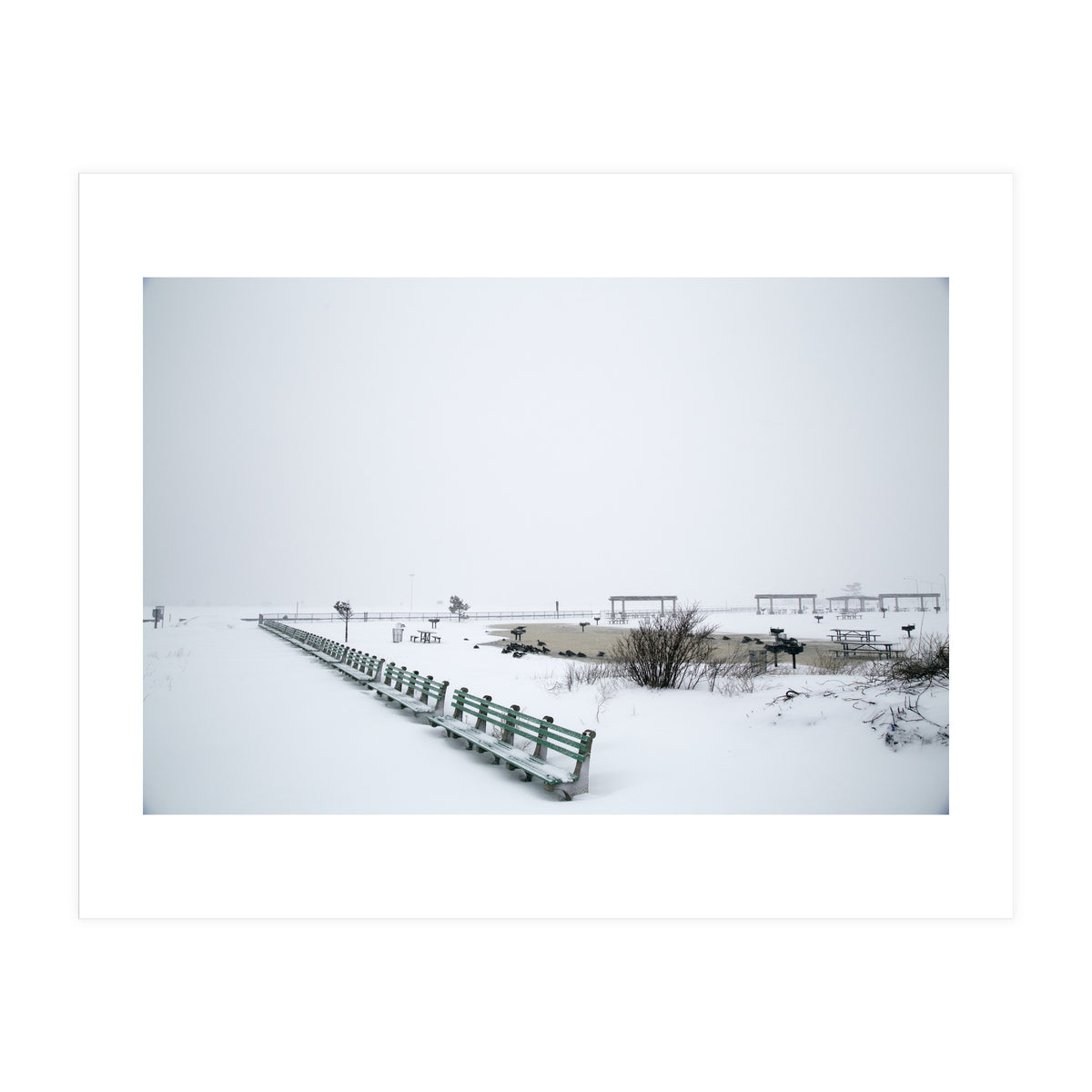 No people on a bench in the snowy winter (Print Only)