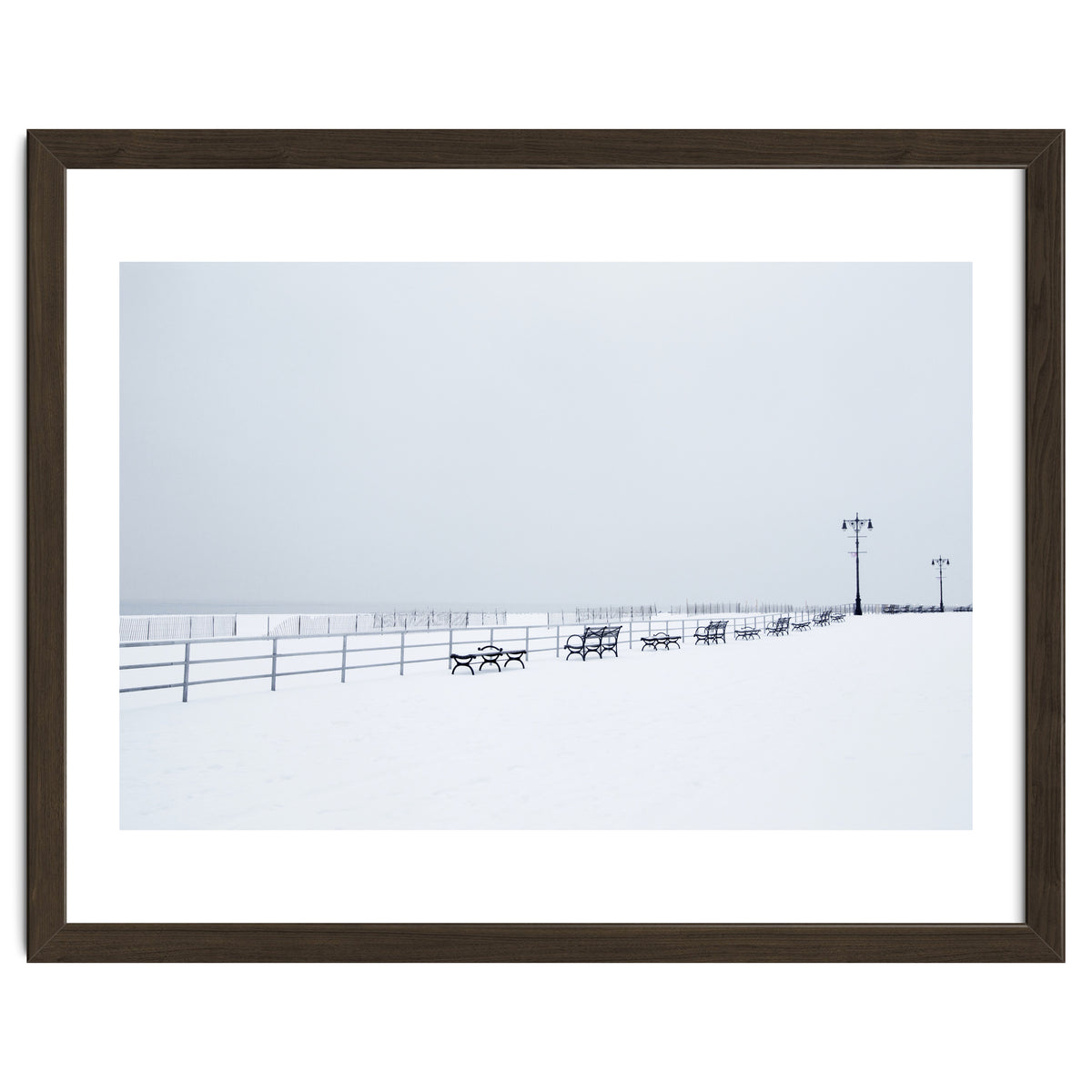 Benches along the pier on snow beach
