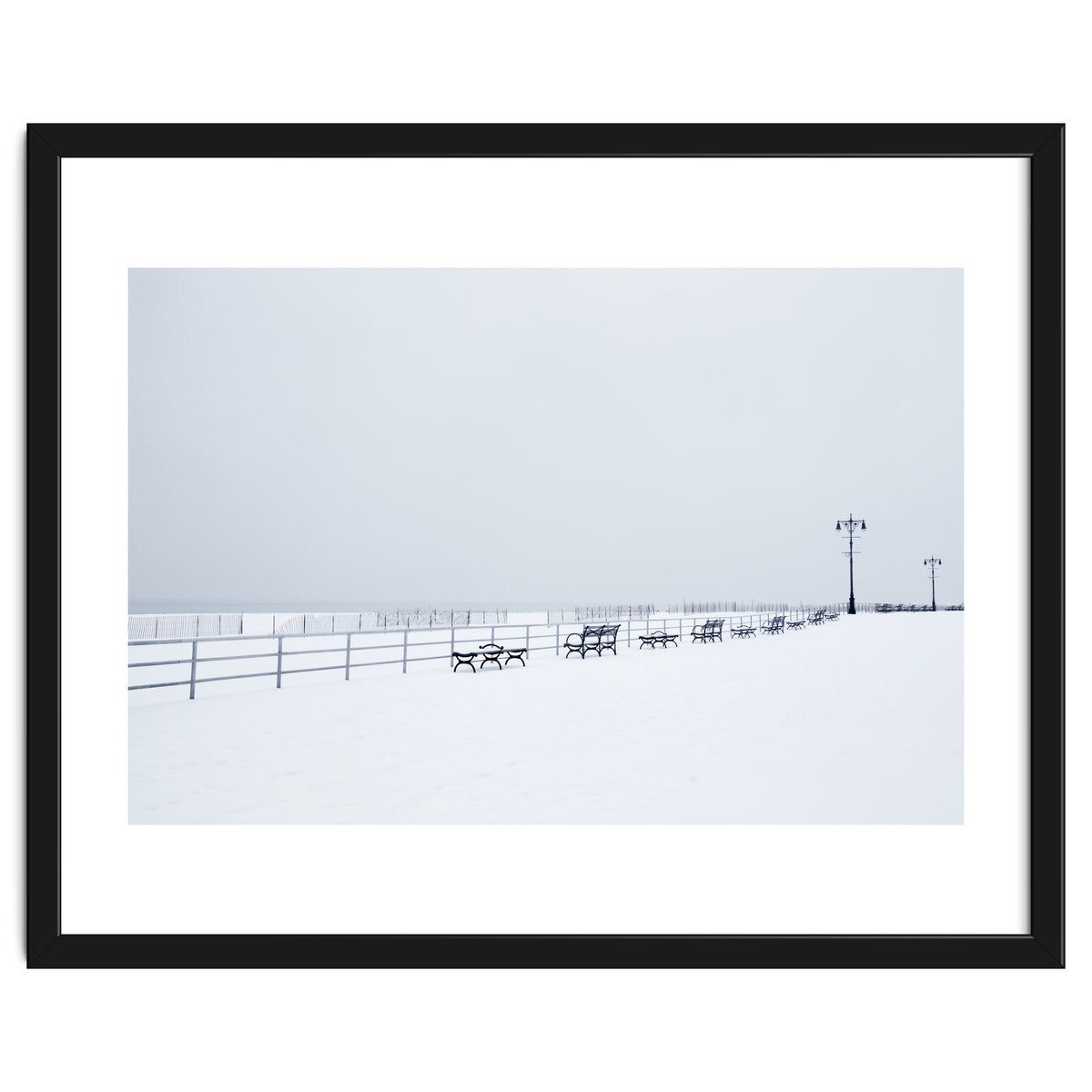 Benches along the pier on snow beach