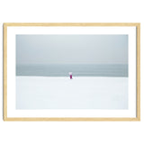 A walking woman in the winter snow beach thumbnail