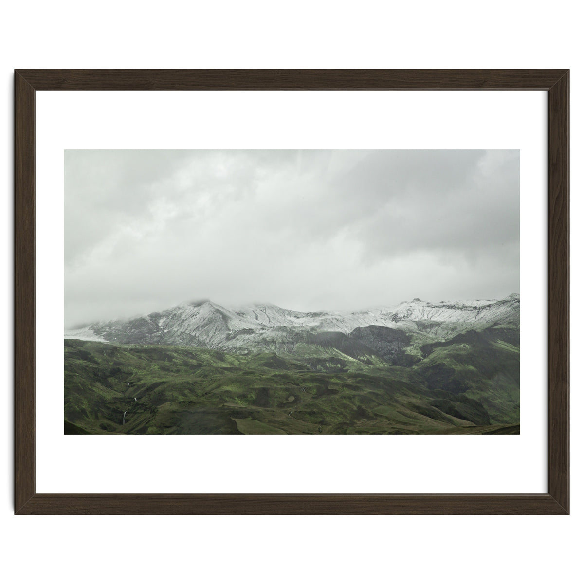 Snow-covered green mountains - Iceland