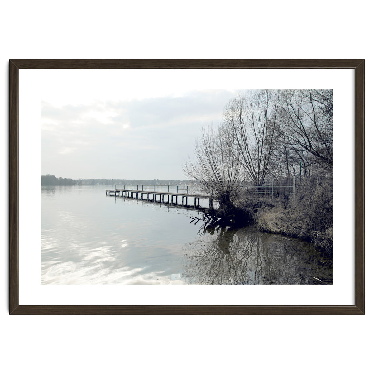 Sunny day pier in the lake