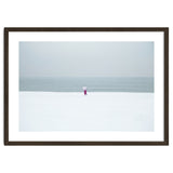 A walking woman in the winter snow beach thumbnail