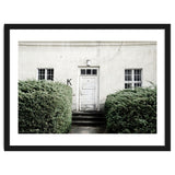 White door K between the green botanical gate thumbnail