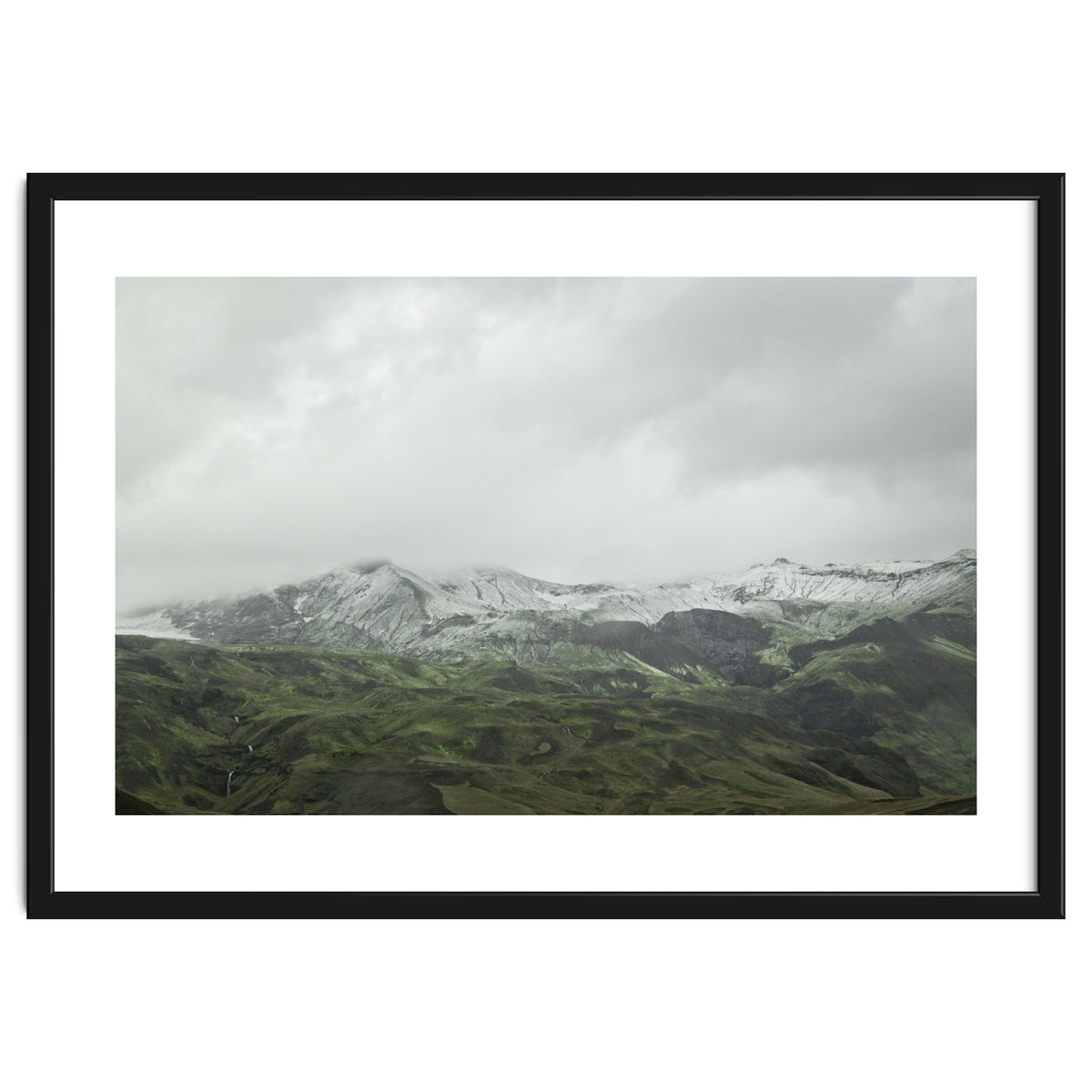 Snow-covered green mountains - Iceland