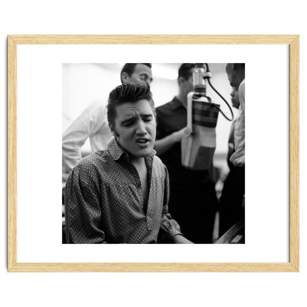 The American singer Elvis Presley during a recording session in 1956.