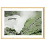 Tourists walking around the waterfall - Iceland thumbnail