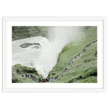 Tourists walking around the waterfall - Iceland thumbnail