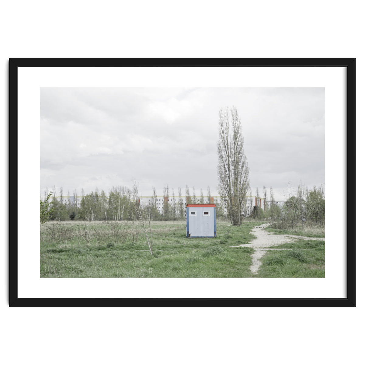Hut in the middle of green field