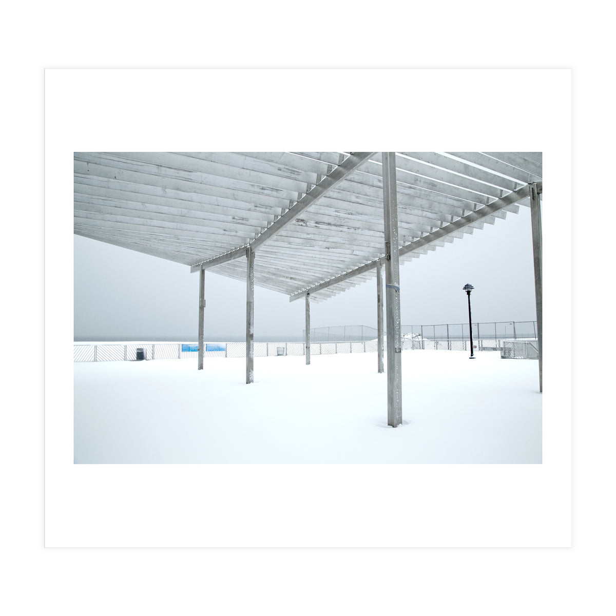Sunshade site in the winter beach (Print Only)