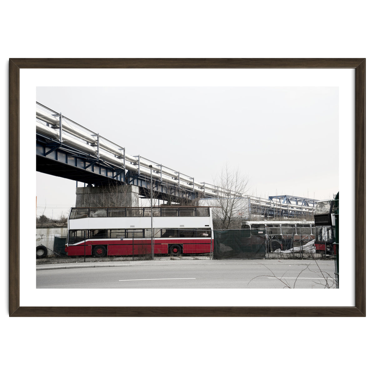 Abandoned Bus under the rail bridge