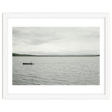 A boy pedaling the Board on the Lake - Iceland thumbnail