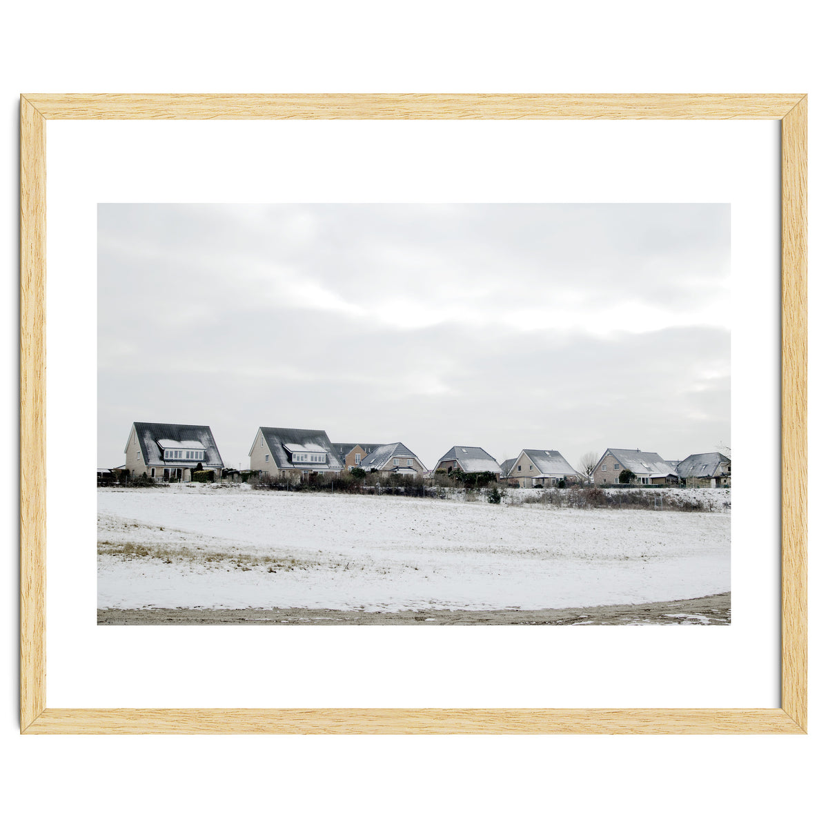 Snow covered houses on the hill