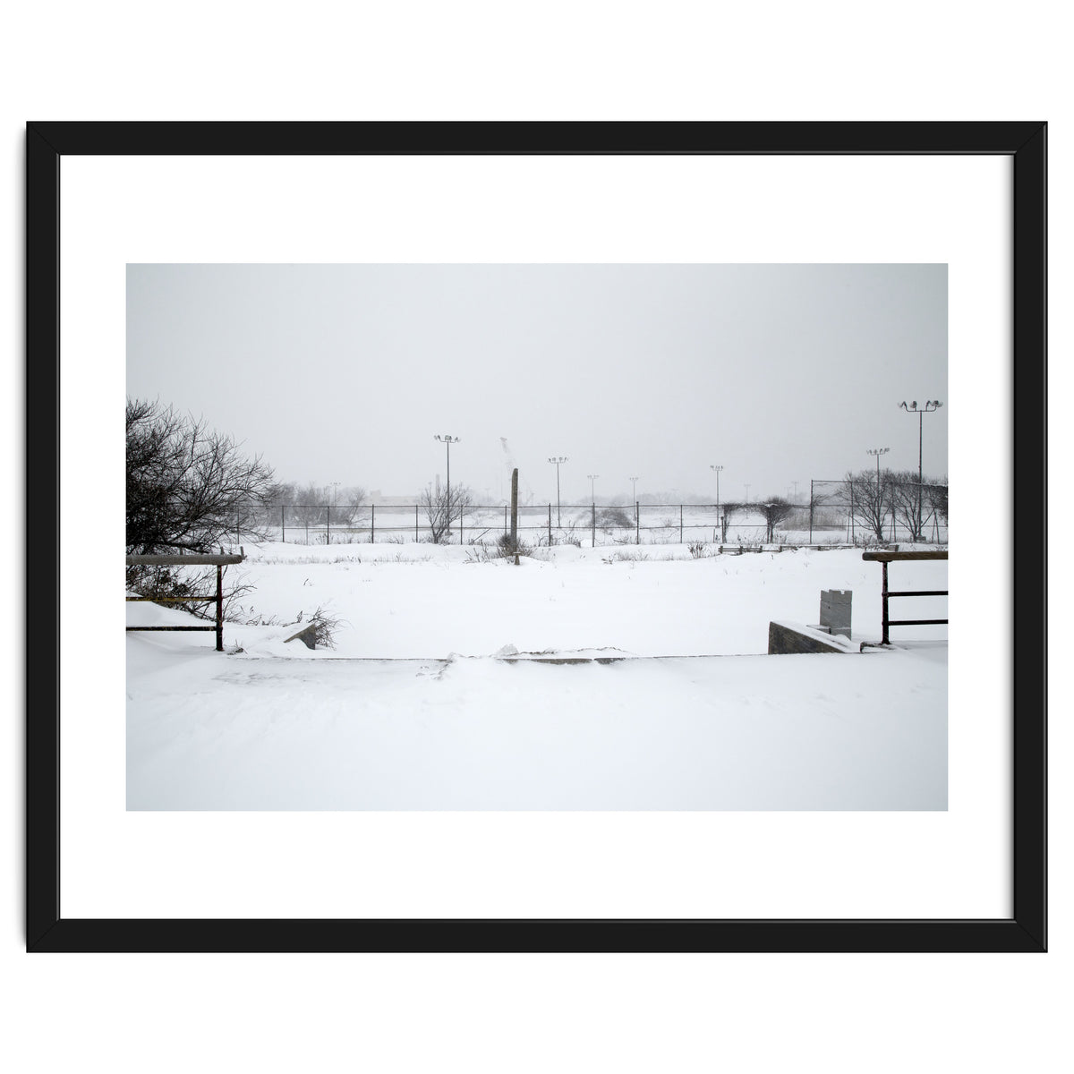 Baseball field covered in snow
