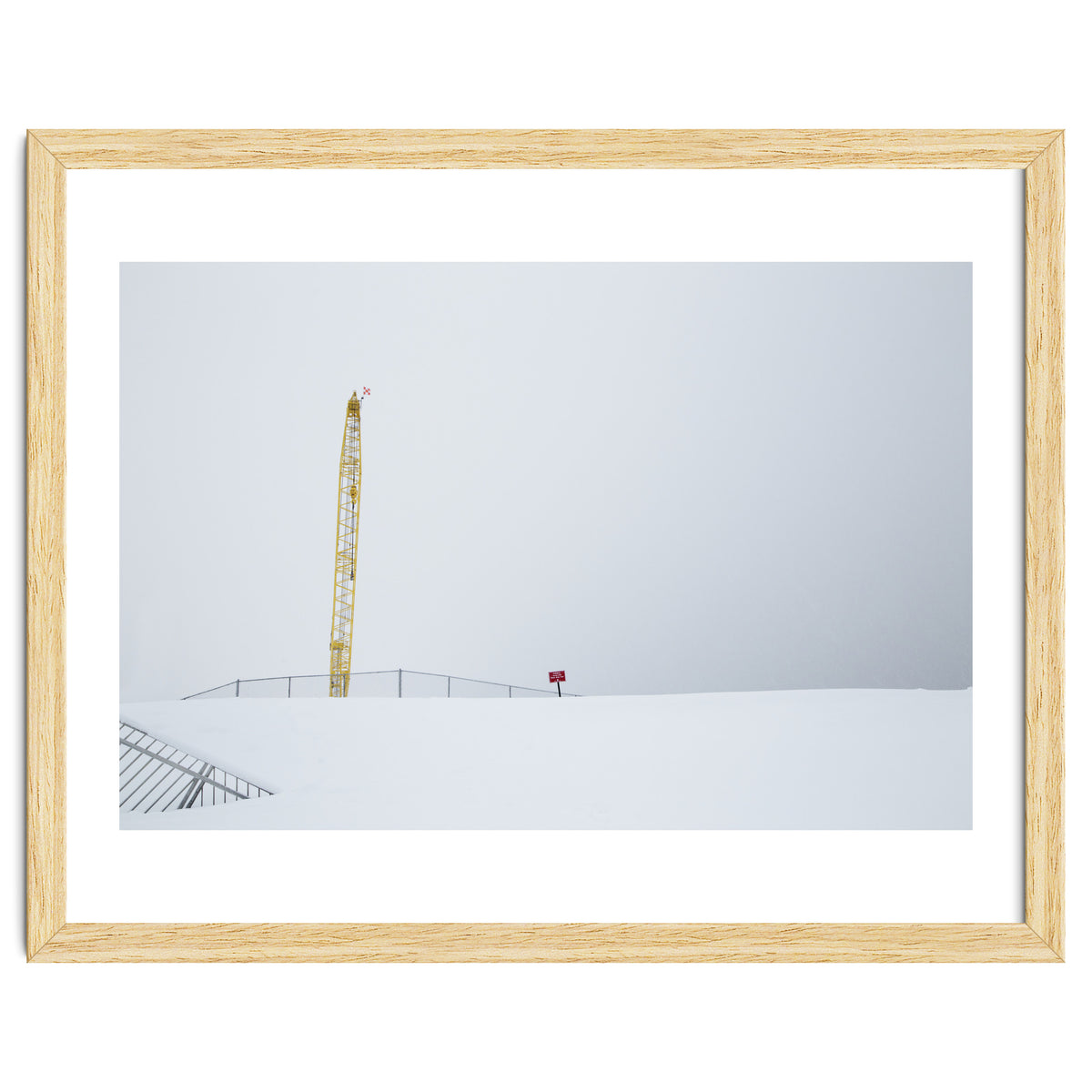 Construction Crane in the Winter Seascape