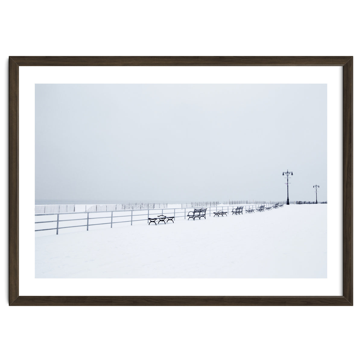 Benches along the pier on snow beach