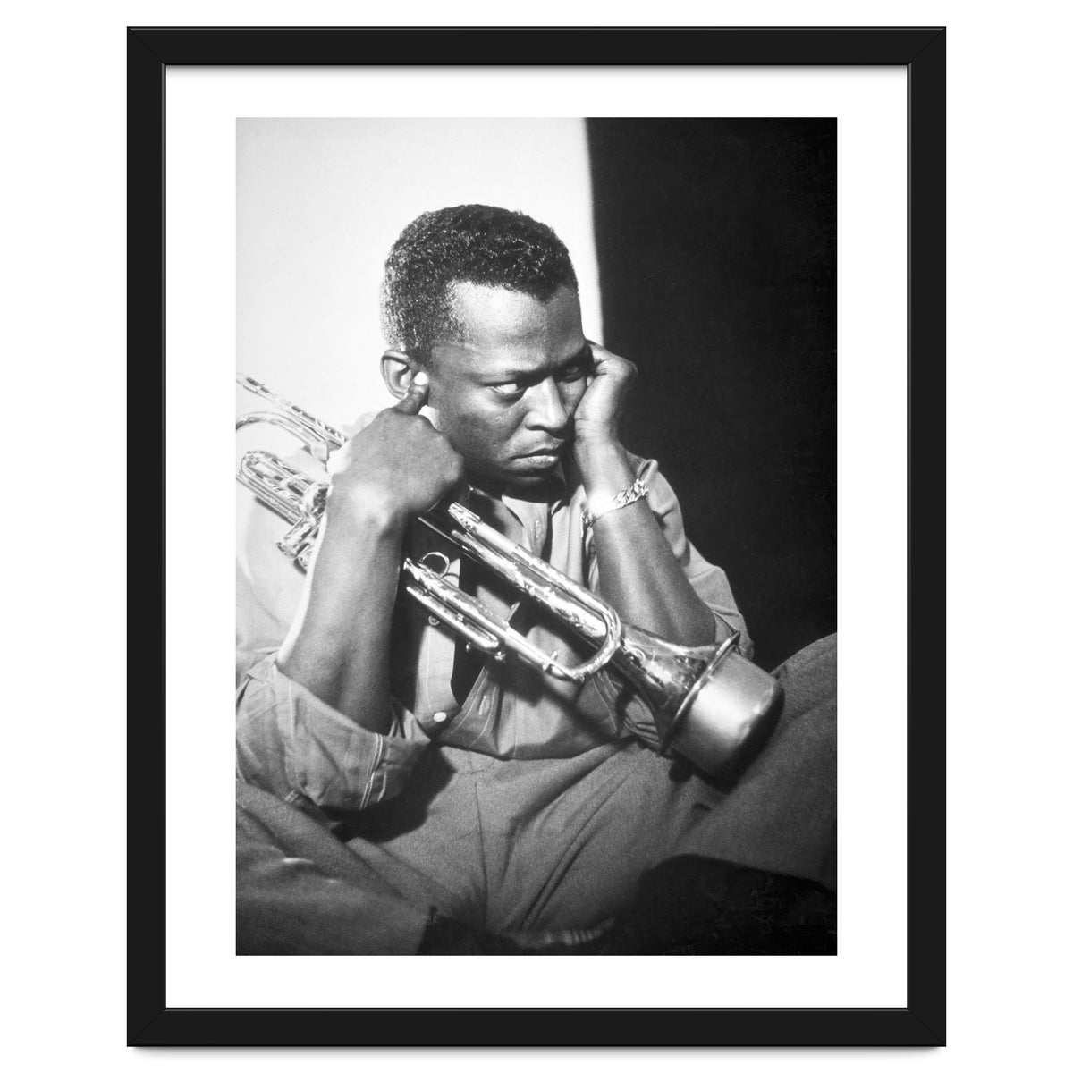 Jazz trumpeter Miles Davis early in his career playing in New York City, circa 1955.