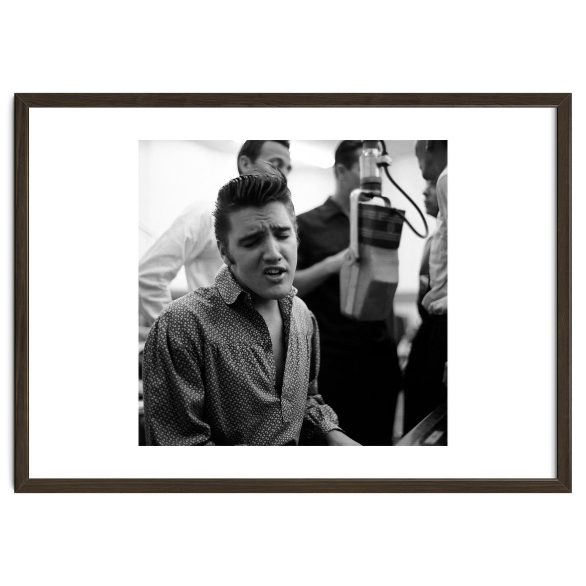 The American singer Elvis Presley during a recording session in 1956.