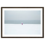 A walking woman in the winter snow beach thumbnail
