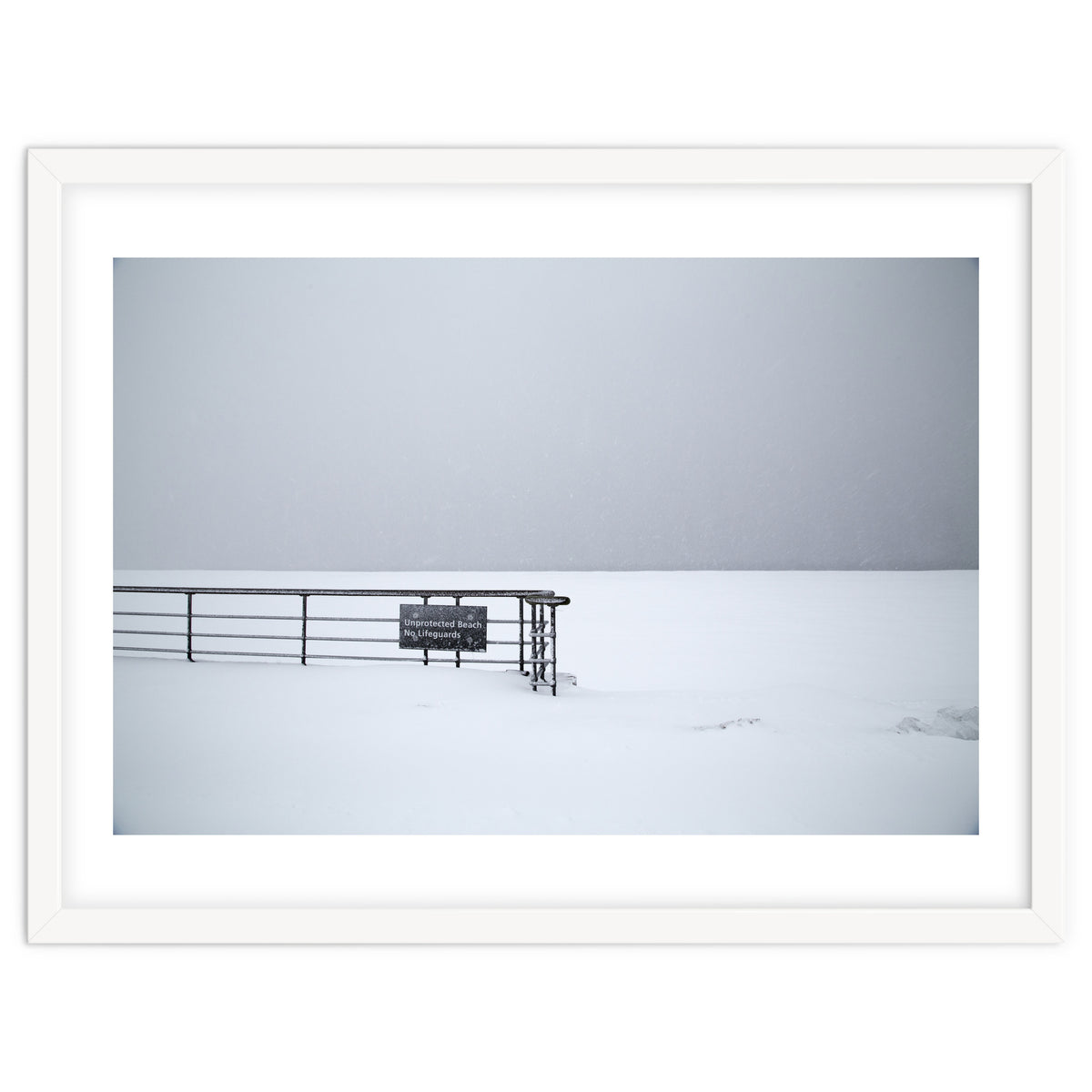 No lifeguards on the sign board in the winter snow beach
