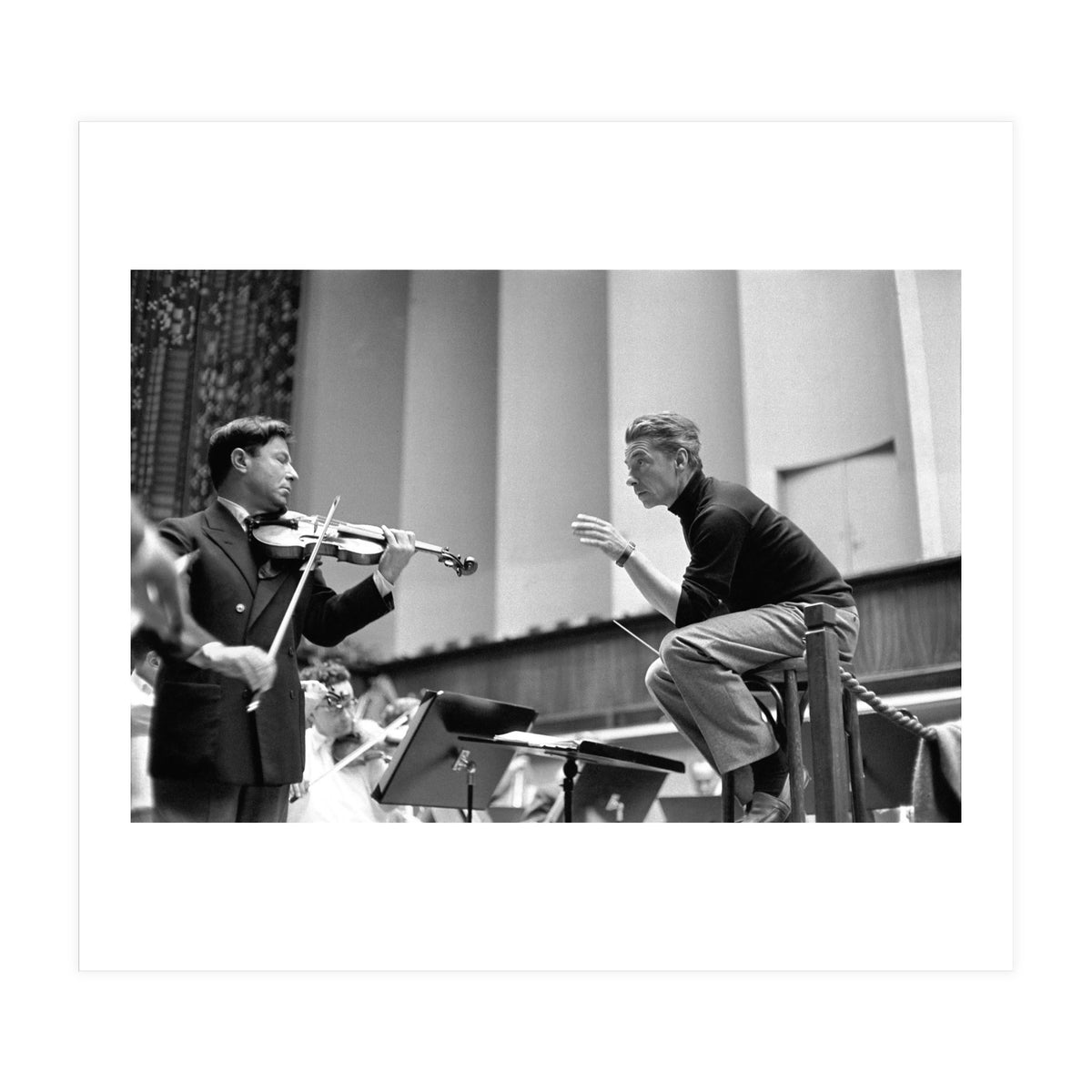 Conductor Herbert von Karajan rehearsing with Nathan Milstein in Lucerne, Switzerland. Lucerne,1957. (Print Only)