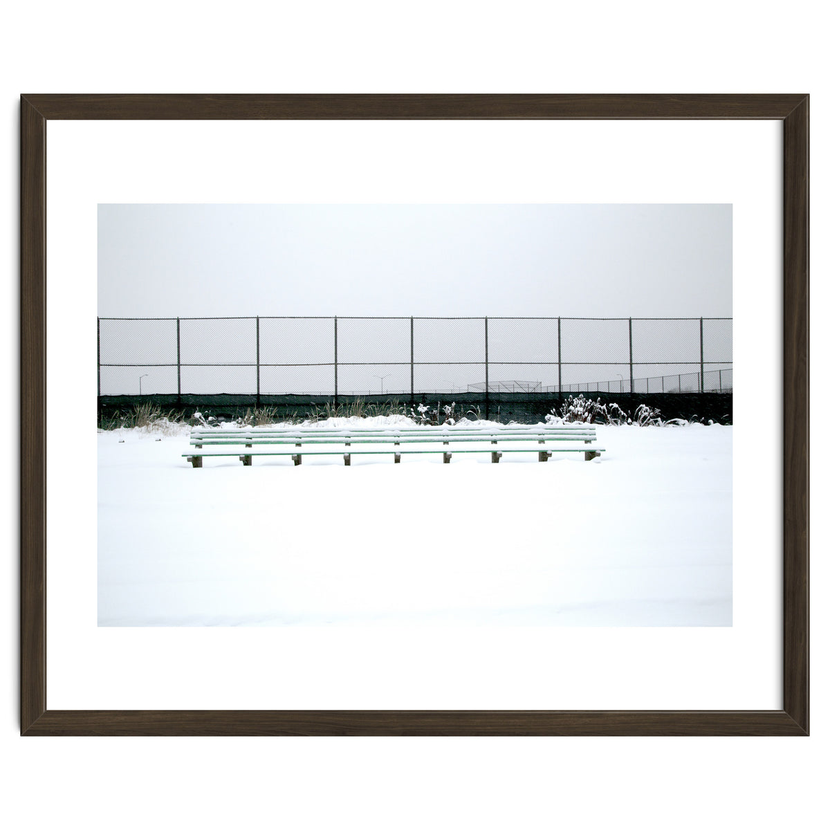 Bench with no people in snowy winter