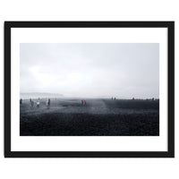 Tourists on the black sand beach - Iceland