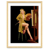 Young And Beautiful Woman Posing In Front Of The Painting Canvas thumbnail