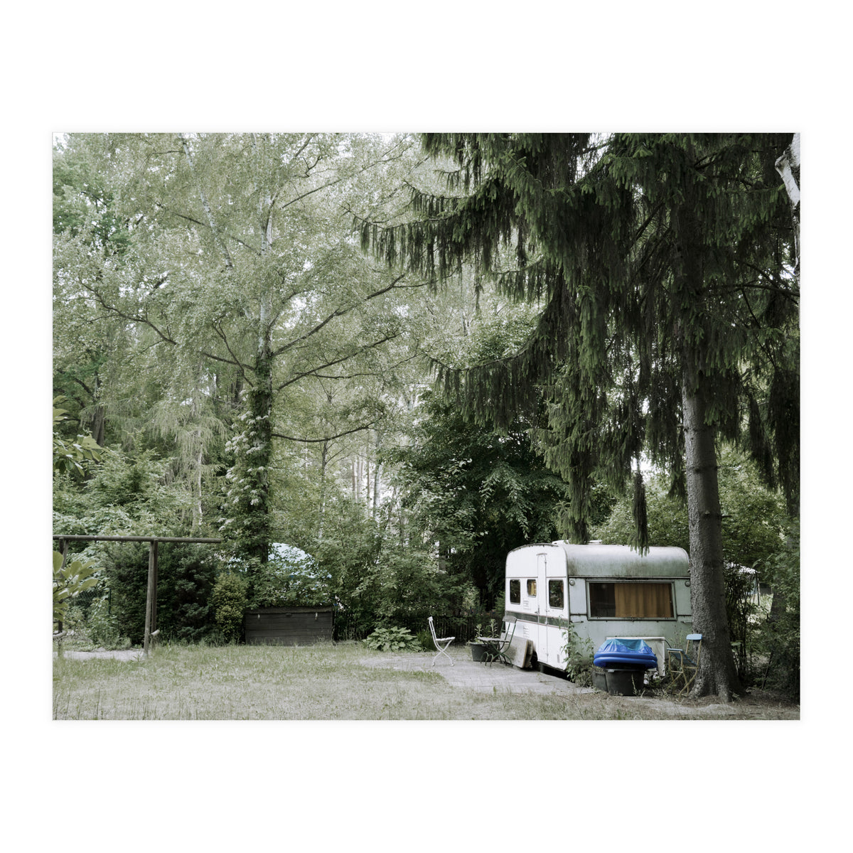 Travel trailer in the green garden (Print Only)