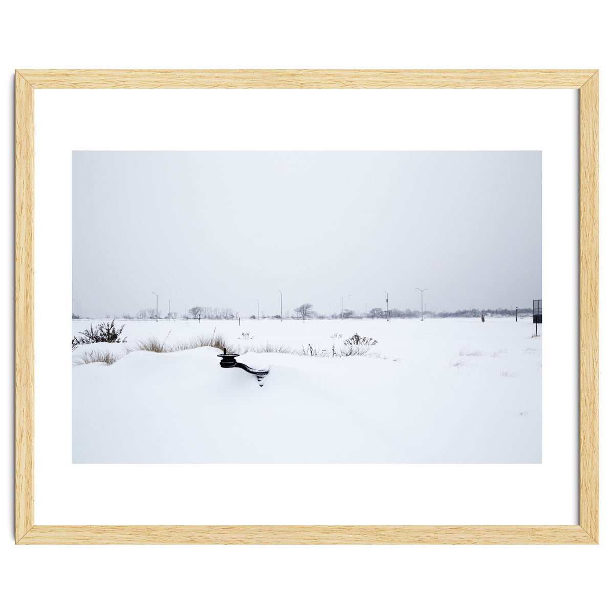 Drinking fountain covered with snow