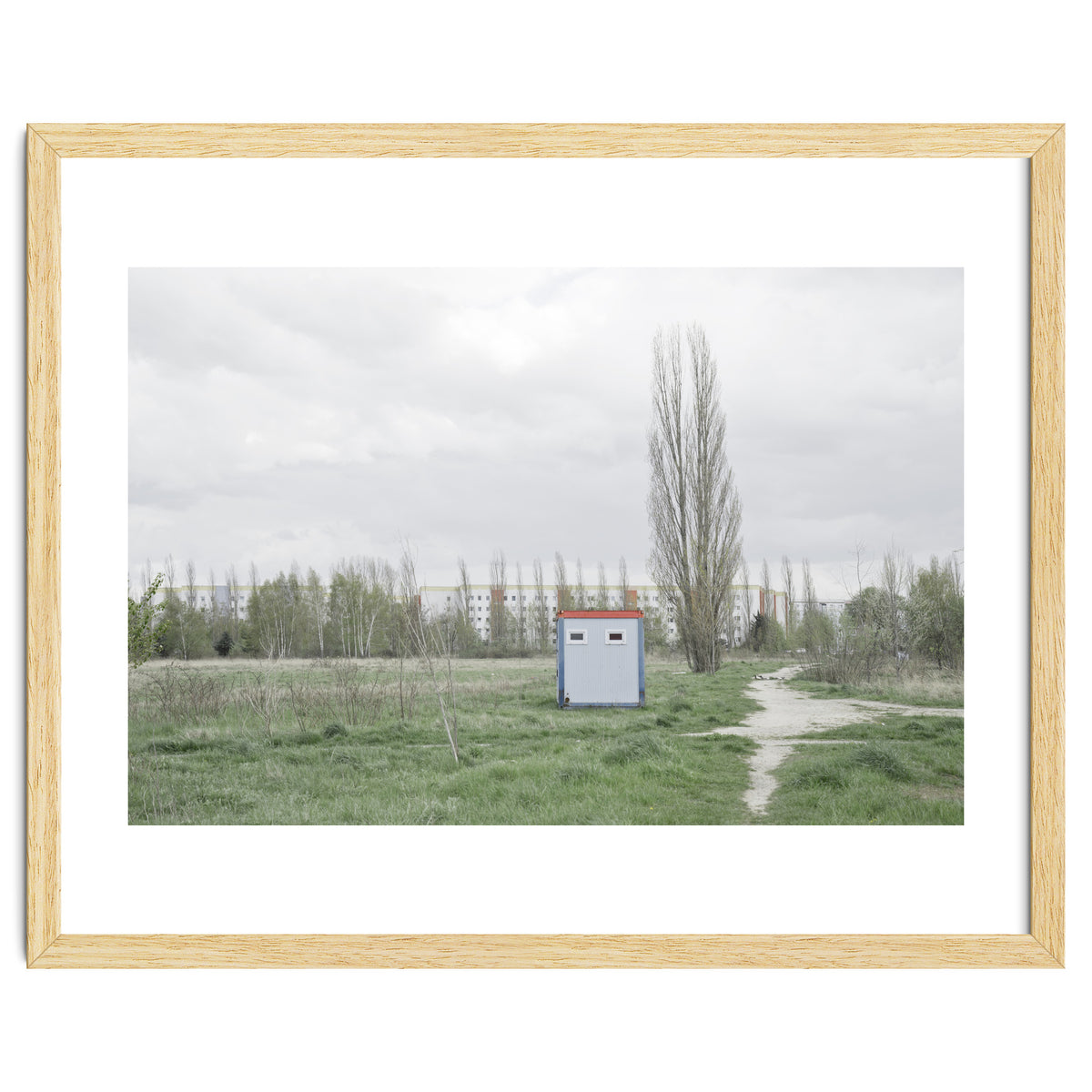 Hut in the middle of green field