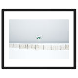 Fake palm tree in the winter snow beach thumbnail