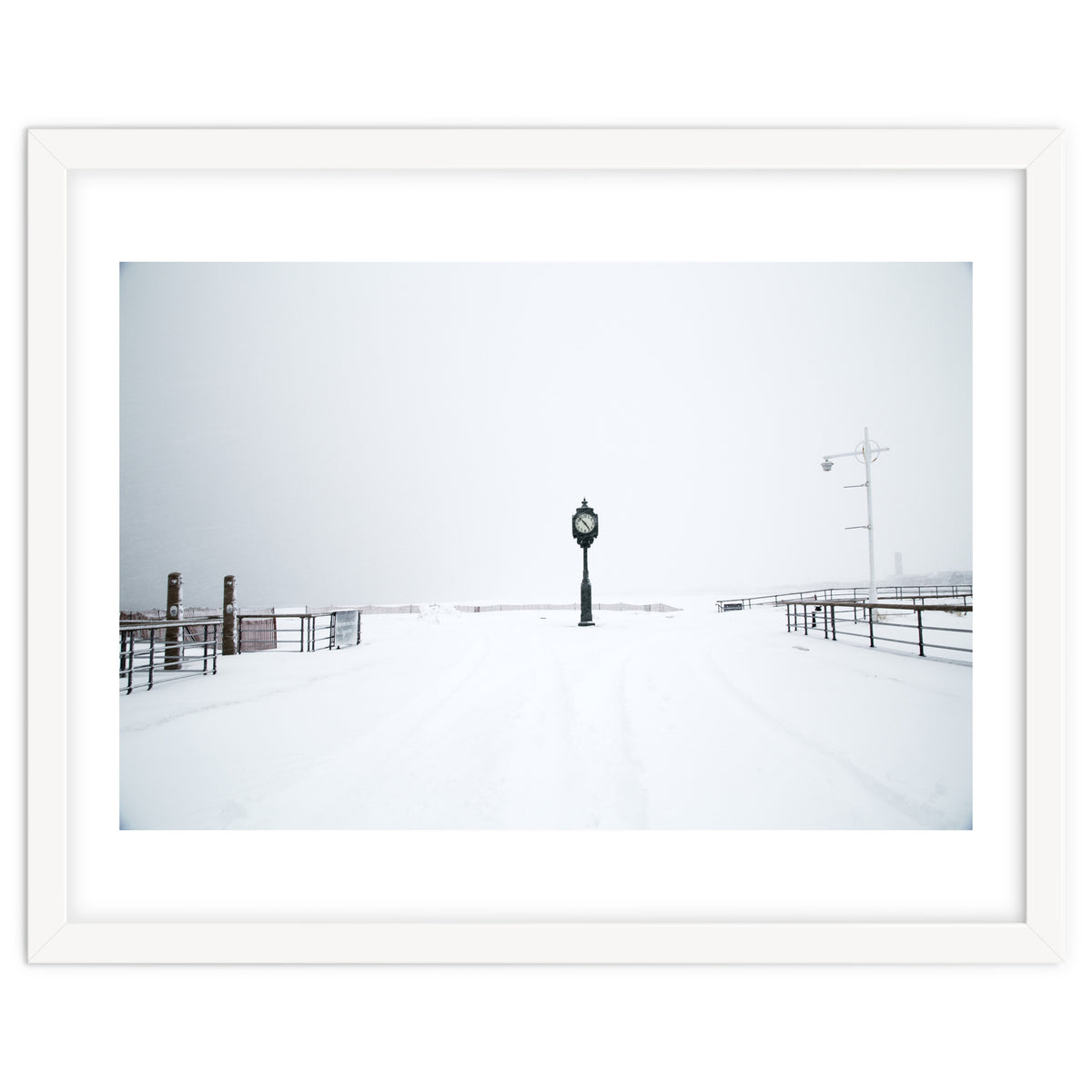 A clock tower in the snow beach