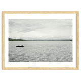 A boy pedaling the Board on the Lake - Iceland thumbnail