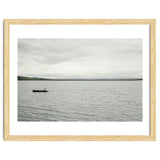 A boy pedaling the Board on the Lake - Iceland thumbnail